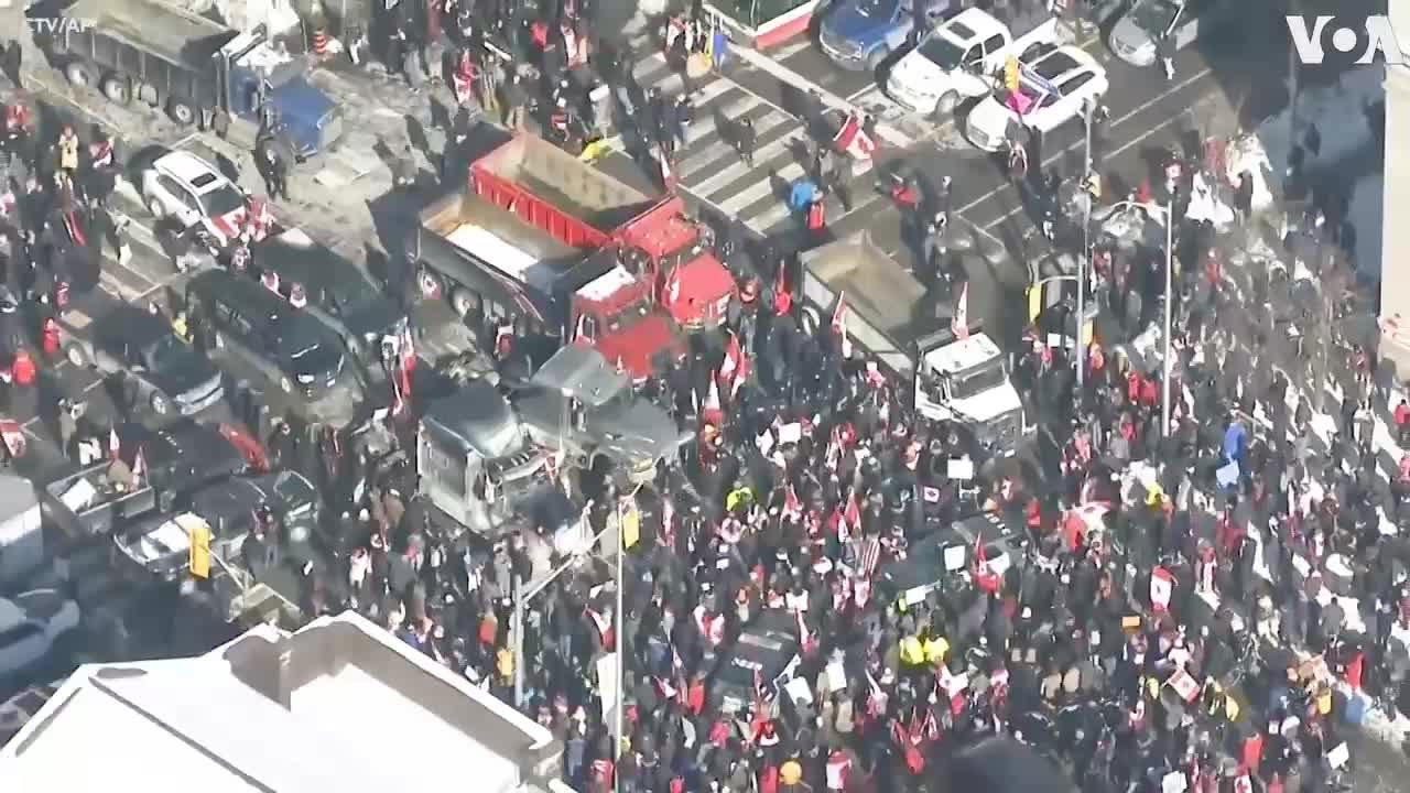 Anti-Vaccine Protesters Gather in Downtown Toronto