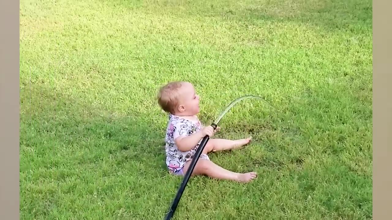 Funny Babies playing with water