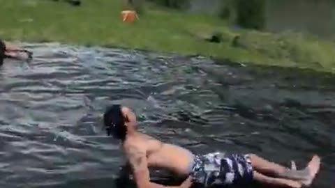 Man Slips and Falls While Taking Run Up on Slip and Slide