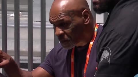 Imagine telling 'Iron' Mike Tyson he can't go to his seat yet