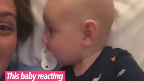 This baby is so excited to see his mom in two places at once.