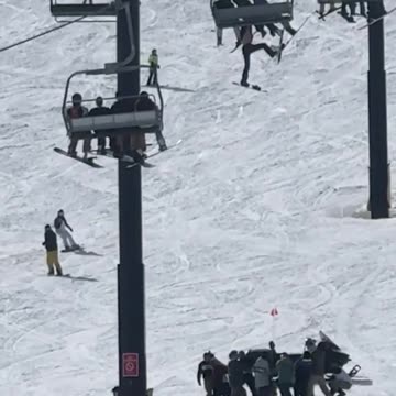 Horror moment teen snowboarder falls from chairlift