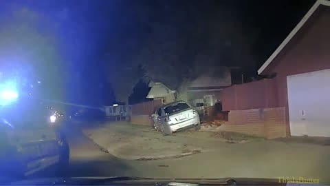 Dash cam shows short pursuit of suspect who fled from a traffic stop and crashed into a wall