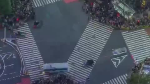 Crossing Shibuya to Tokyo, Japan