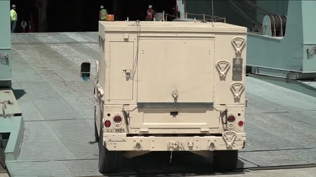 Military equipment moving through JAXPORT, heading overseas