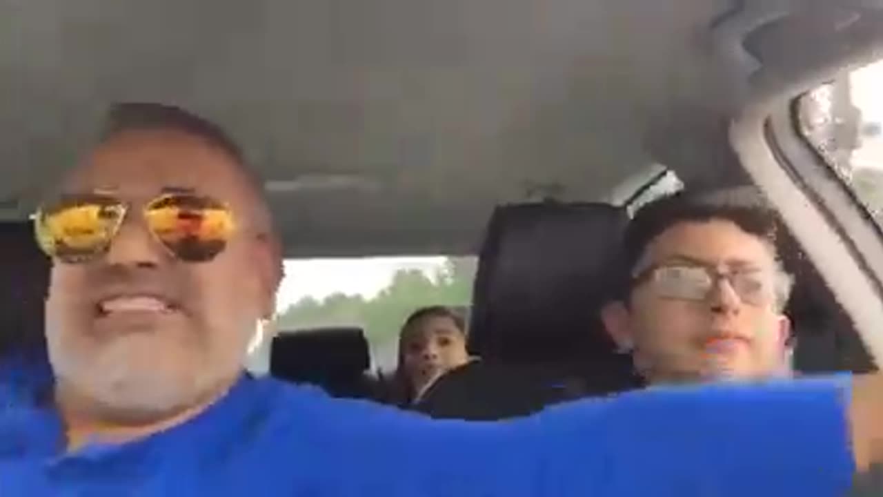 Dad takes his son for his first drive.