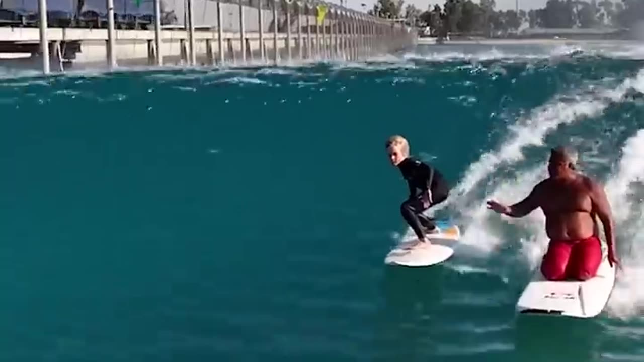 Lil Surfer with Raimana at Surf Ranch - Best Coach!