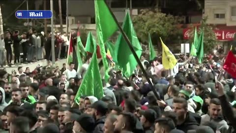 Palestinians in West Bank celebrate return of released prisoners