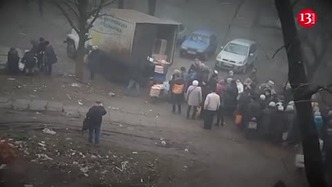 People line up for bread in Mariupol