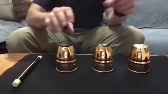 Easy version of Ancient Cups and Balls trick