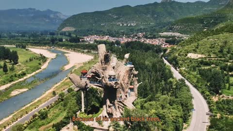 There is this scenic spot in Hebei, and the trees are covered with buildings.