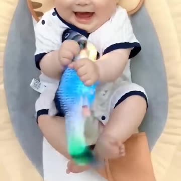 Cute babies playing video