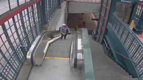 A NIGGER THROWS AN ELDERLY WHITE WOMAN DOWN TWO FLIGHTS OF STAIRS AND KICKS HER