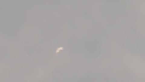 UFO flying across the sky.