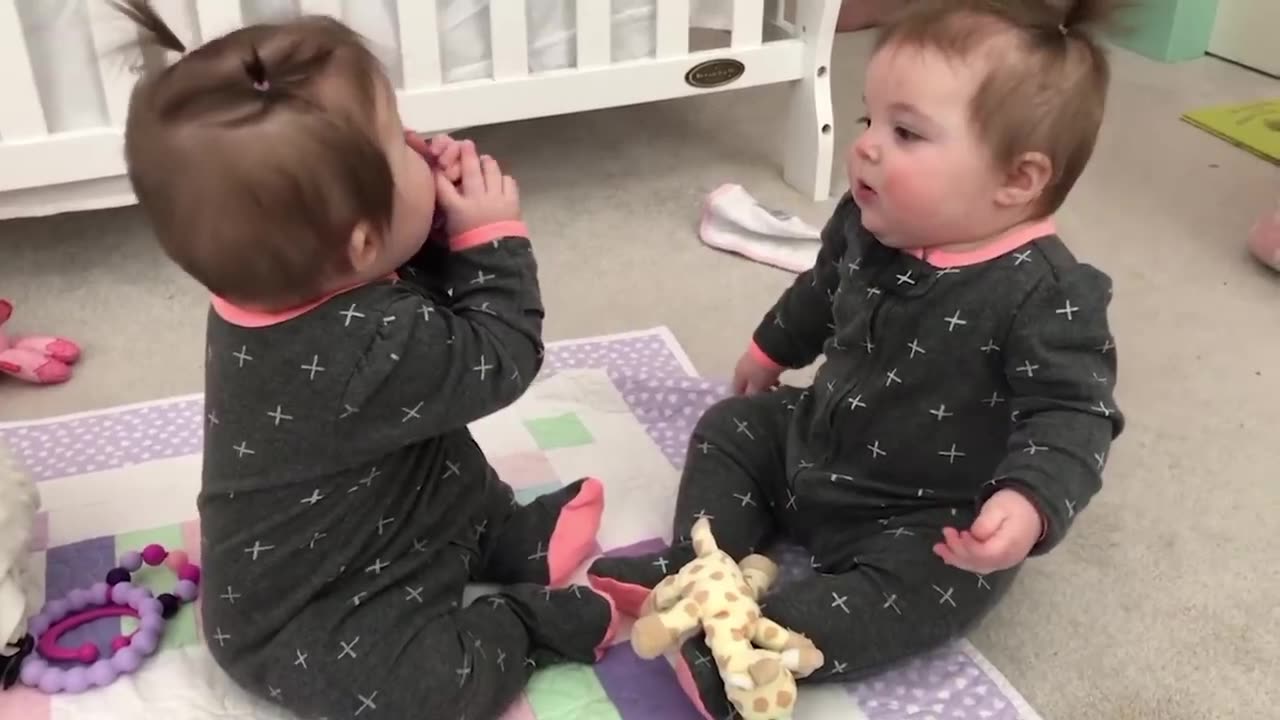 Funiest TWINS baby girl share a Pecifire