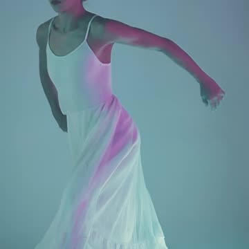 Girl dancing with the white dress
