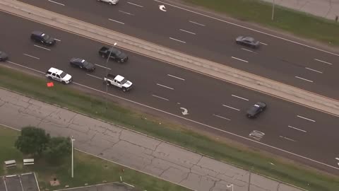 HELICOPTER CAM - Truck Continues Driving after Flipping During Police Chase