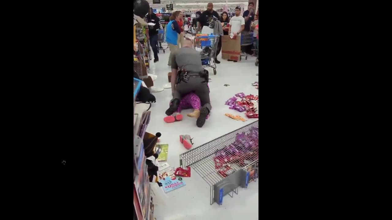 A women gets arrested after slapping a cop and destroying Walmart property