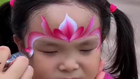 Amazing paint drawing on face