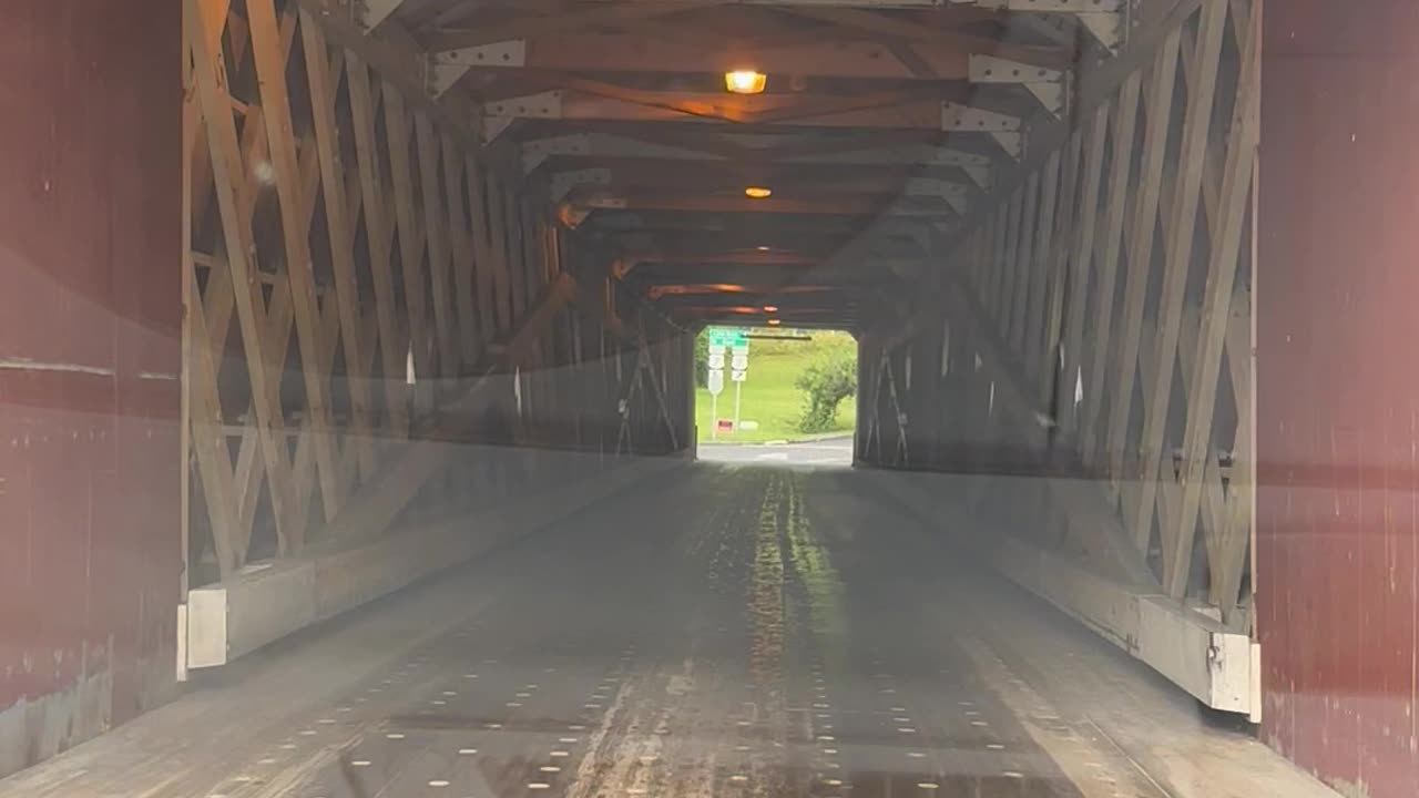 driving through a cover bridge in new england