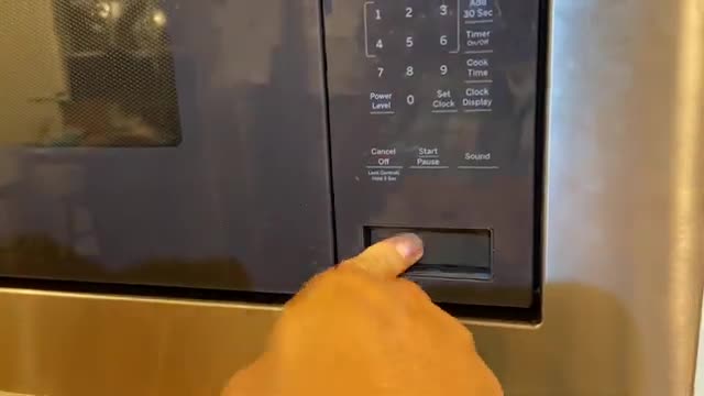 How to fix GE Profile microwave door stuck on close.