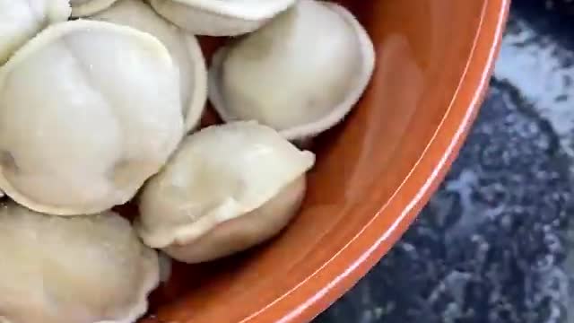 Dumplings with cream sauce