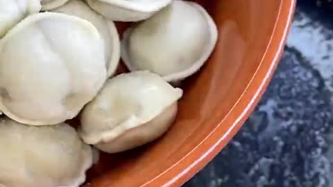 Dumplings with cream sauce