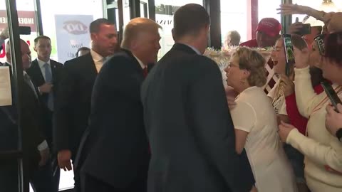 Trump hands out free ice cream at Dairy Queen following campaign rally in Iowa