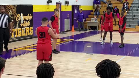 Disabled Player Scores a Basket and Celebrates with Crowd