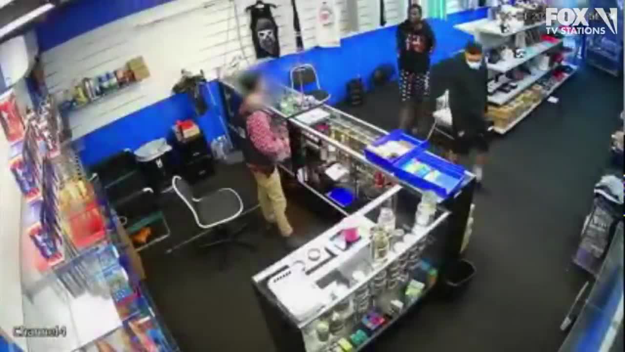 VIDEO: Gun battle breaks out between store employee and would-be robbers