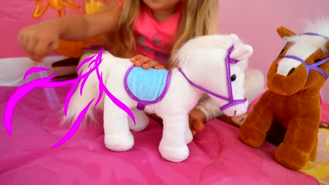 Diana and Roma Plays with toy horses