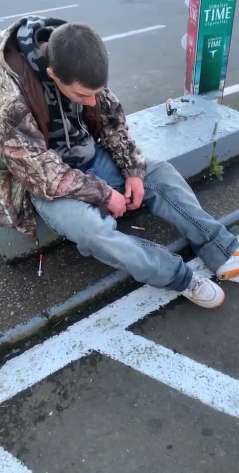 Druggie in a parking lot