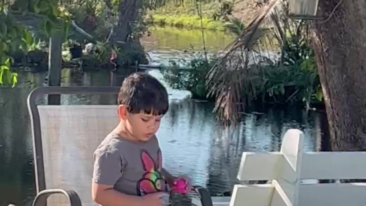 Elijah fishing in turtle pool. 3-1-23