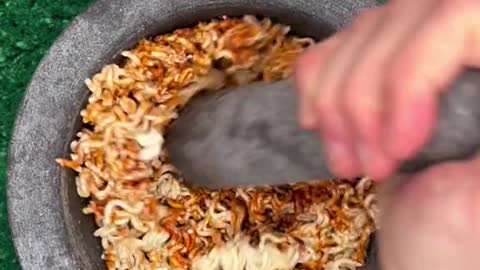 bro eating raw noodles