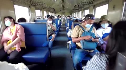 Thailand's 'floating train' a hit as dam waters rise