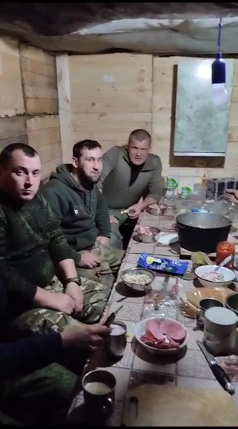 RU POV: 26-11-2023: Tankers of the 36th motorized rifle brigade. Footage of a field dinner.