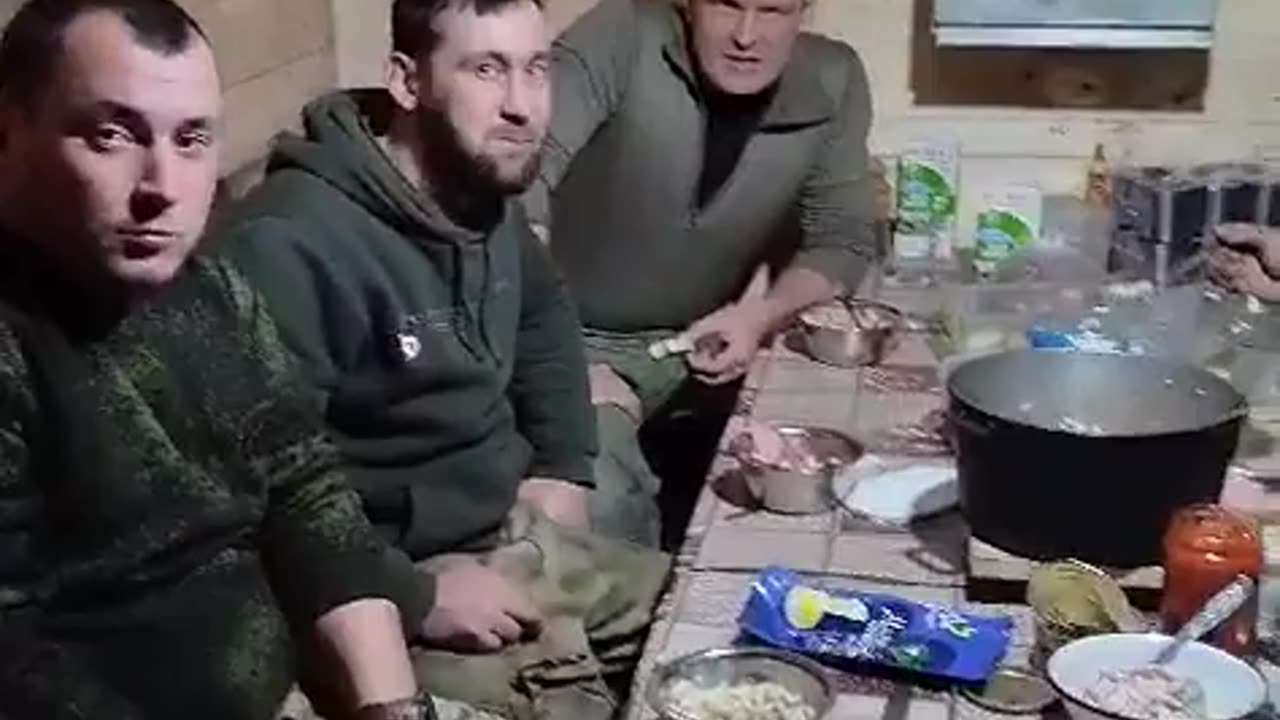 RU POV: 26-11-2023: Tankers of the 36th motorized rifle brigade. Footage of a field dinner.