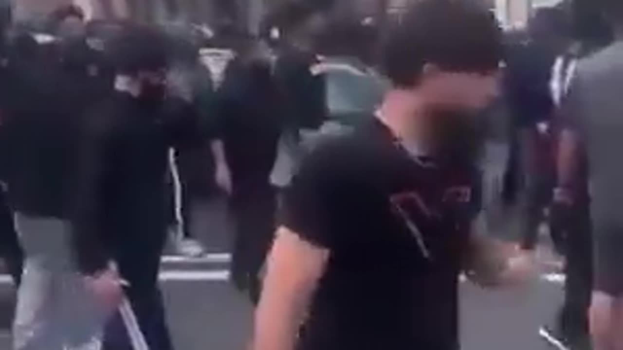 UK: Masked gangs armed with axes & hammers are attacking protestors