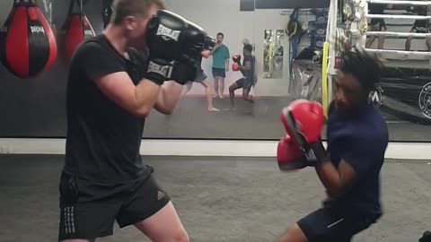 My first time sparring a fully trained kickboxer .