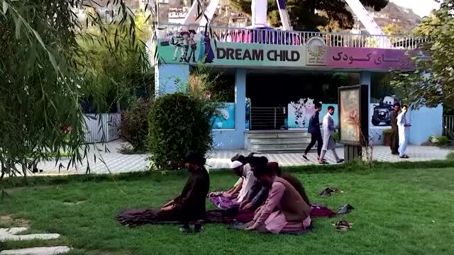 Watch Taliban play bumper cars at an amusement park