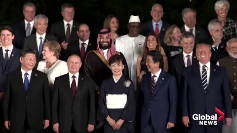 G20 summit_ World leaders pose for _family photo_ in Osaka