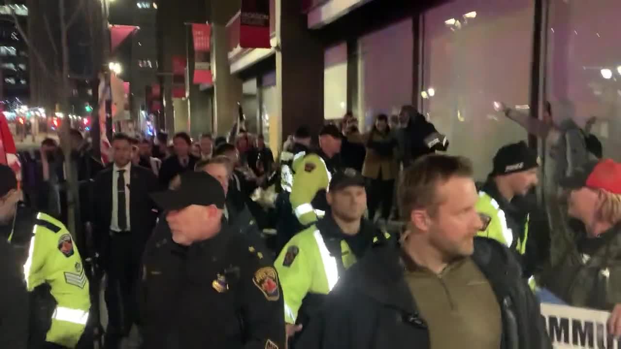 Justin Trudeau swarmed by angry protesters outside the Bread Bar in Hamilton