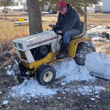 old 2022 video of tim putting his tractor though a snowbank Not YT Synced