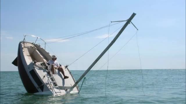 Boats Sinking in Harbor and Seas