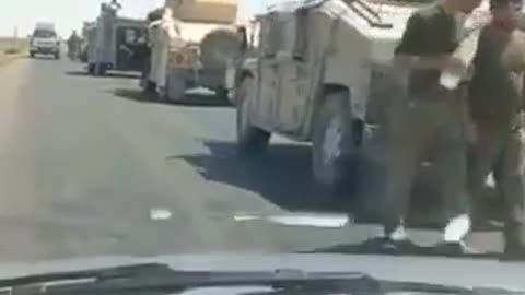 Afghanistan’s military convoy can be seen fleeing to Iran with their US equipment.