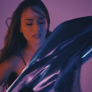 Woman dancing by the wind