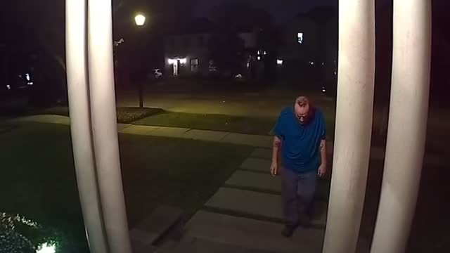 Man checking doorknobs in Houston