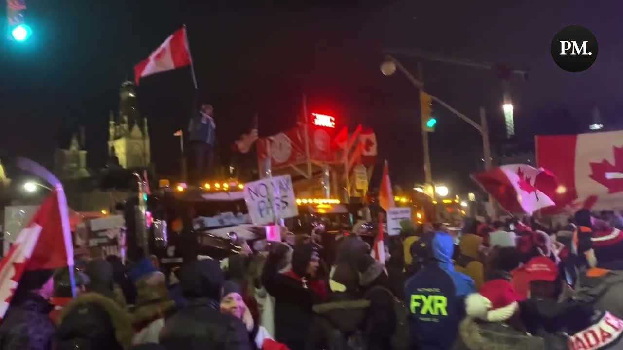 The crowd at Parliament Hill chants "I love Canada!"