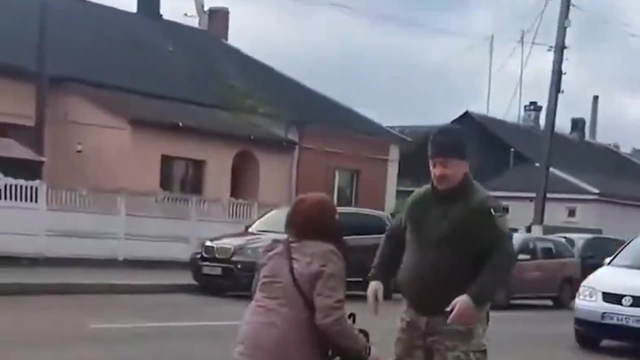 Ukrainian woman fights Zelensky recruiter van as they take her close family member to the RUSSIAN MEAT GRINDER