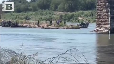 TEXAS TROOPERS REMOVE VENEZUELAN FLAG PLANTED BY MIGRANTS ON BORDER RIVER ISLAND